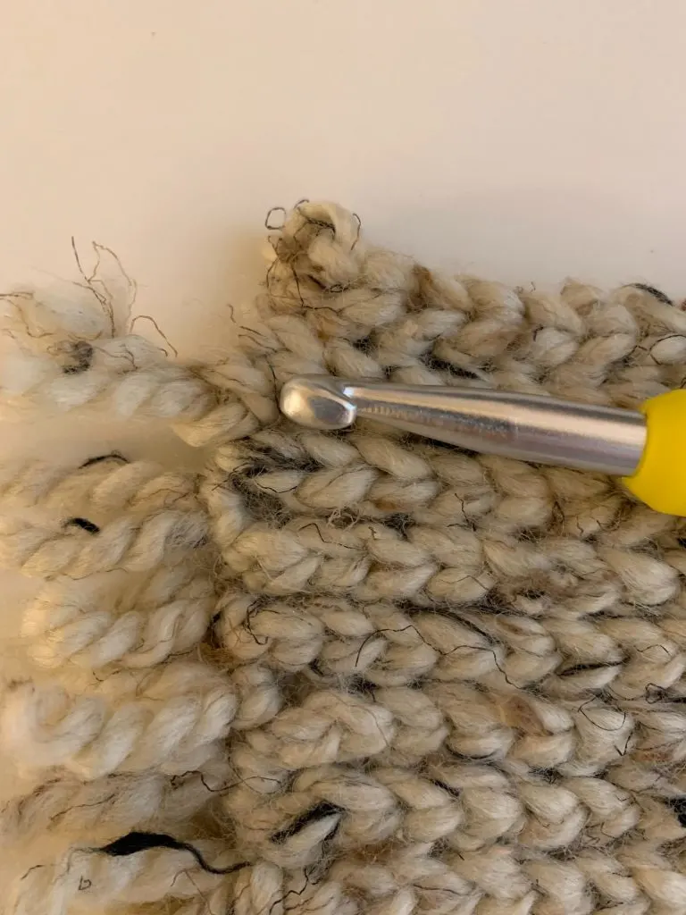 adding fringe to a crochet rug