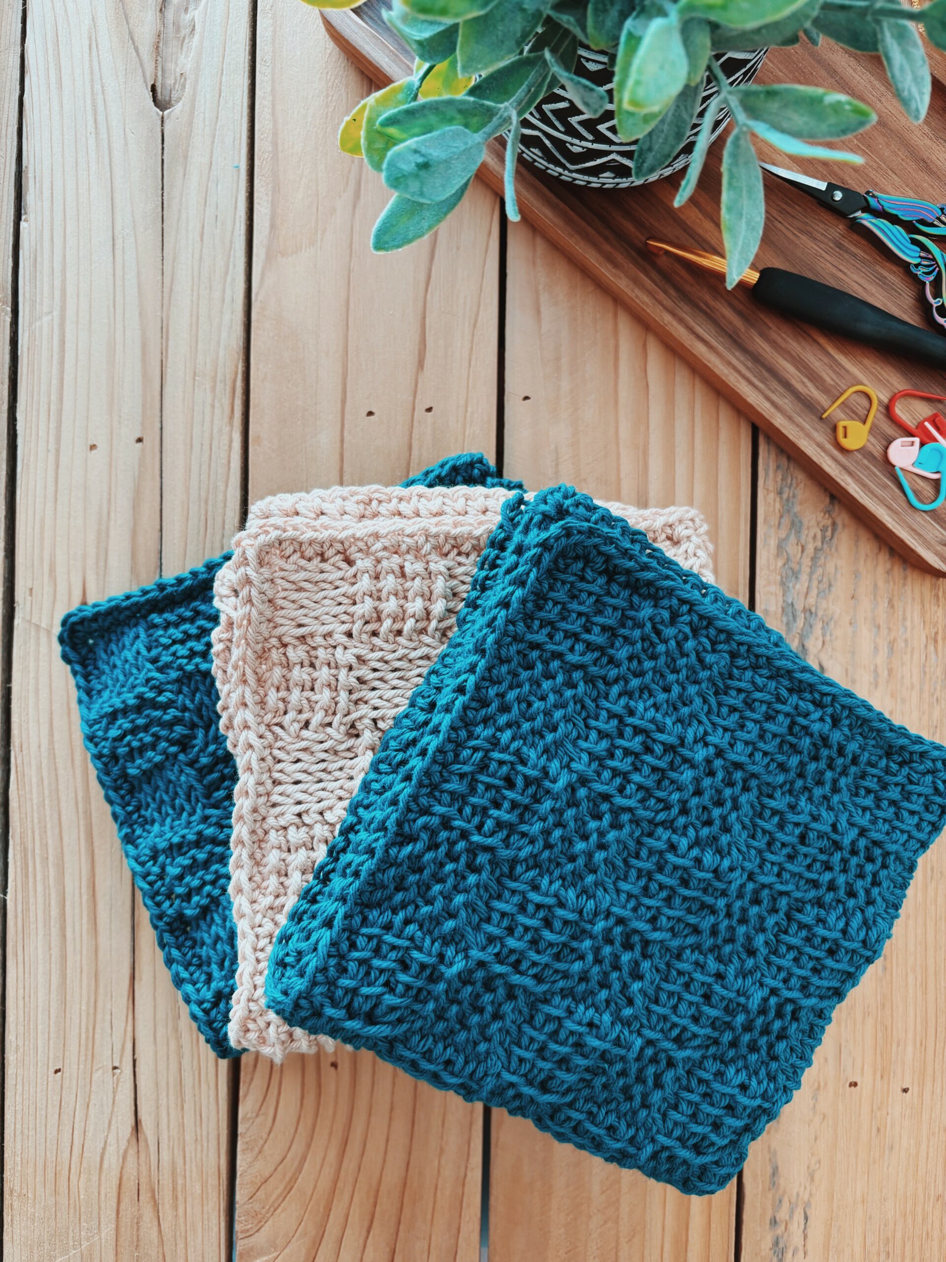 Washcloths made with the Tunisian crochet basketweave stitch three different ways