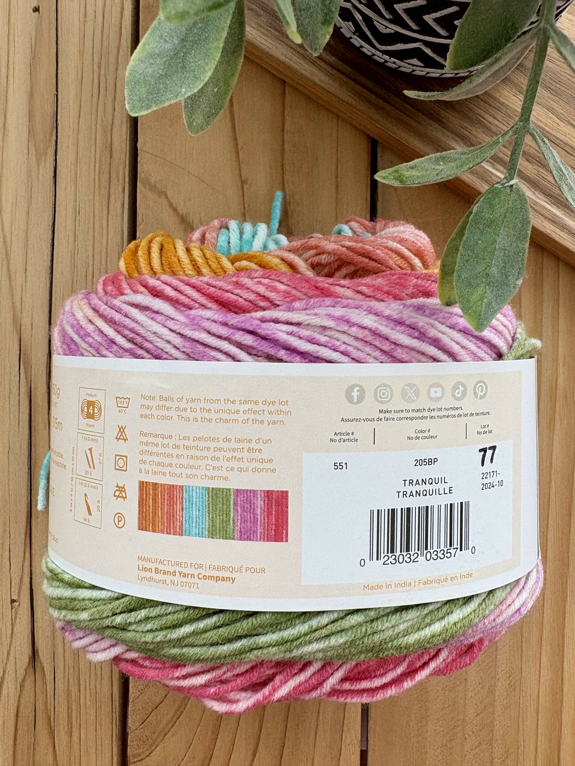 Yarn label with symbols and numbers explained for beginners, highlighting gauge and yarn weight information