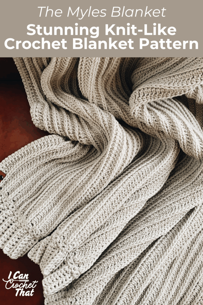 A gray, textured crochet blanket with a knit-like appearance is draped in folds; text at the top reads, Stunning Knit-Like Crochet Blanket Pattern.