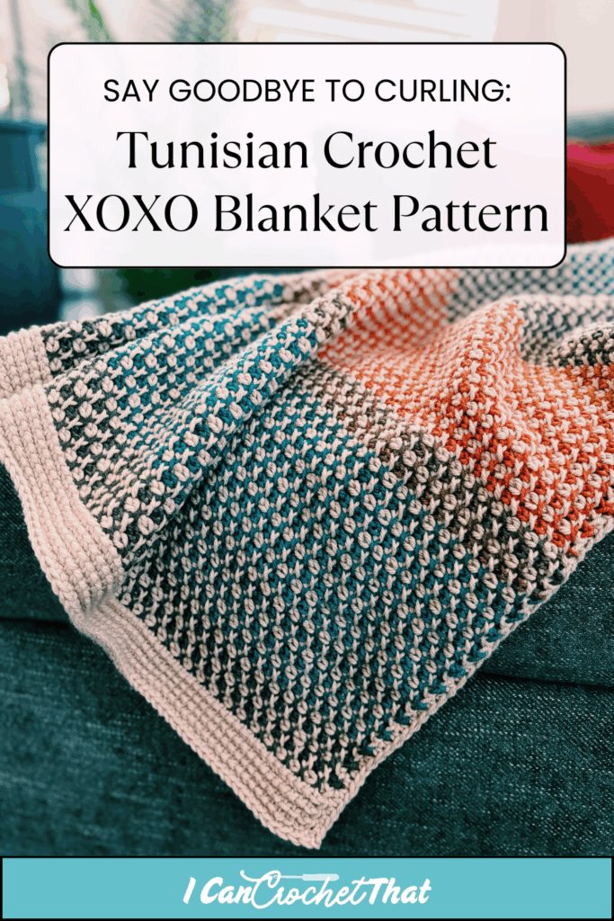 A multicolored Tunisian crochet XOXO blanket with a light border is draped over the arm of a dark teal sofa. Text above describes the pattern and anti-curling feature.